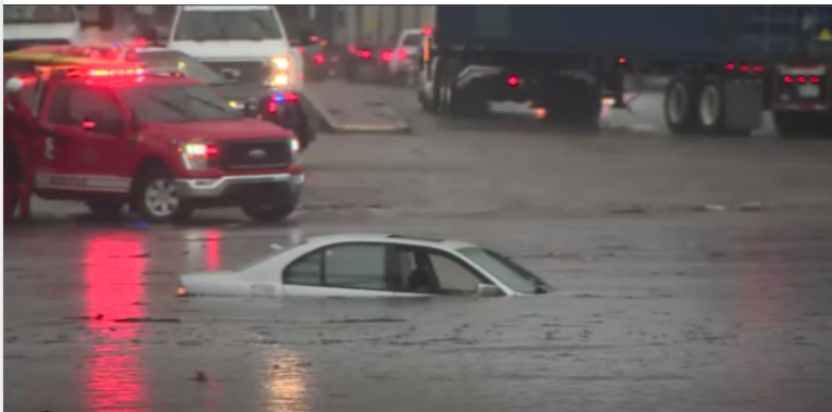 California rain: Long Beach cars submerged in flood waters